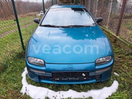 Online auction: MAZDA  323