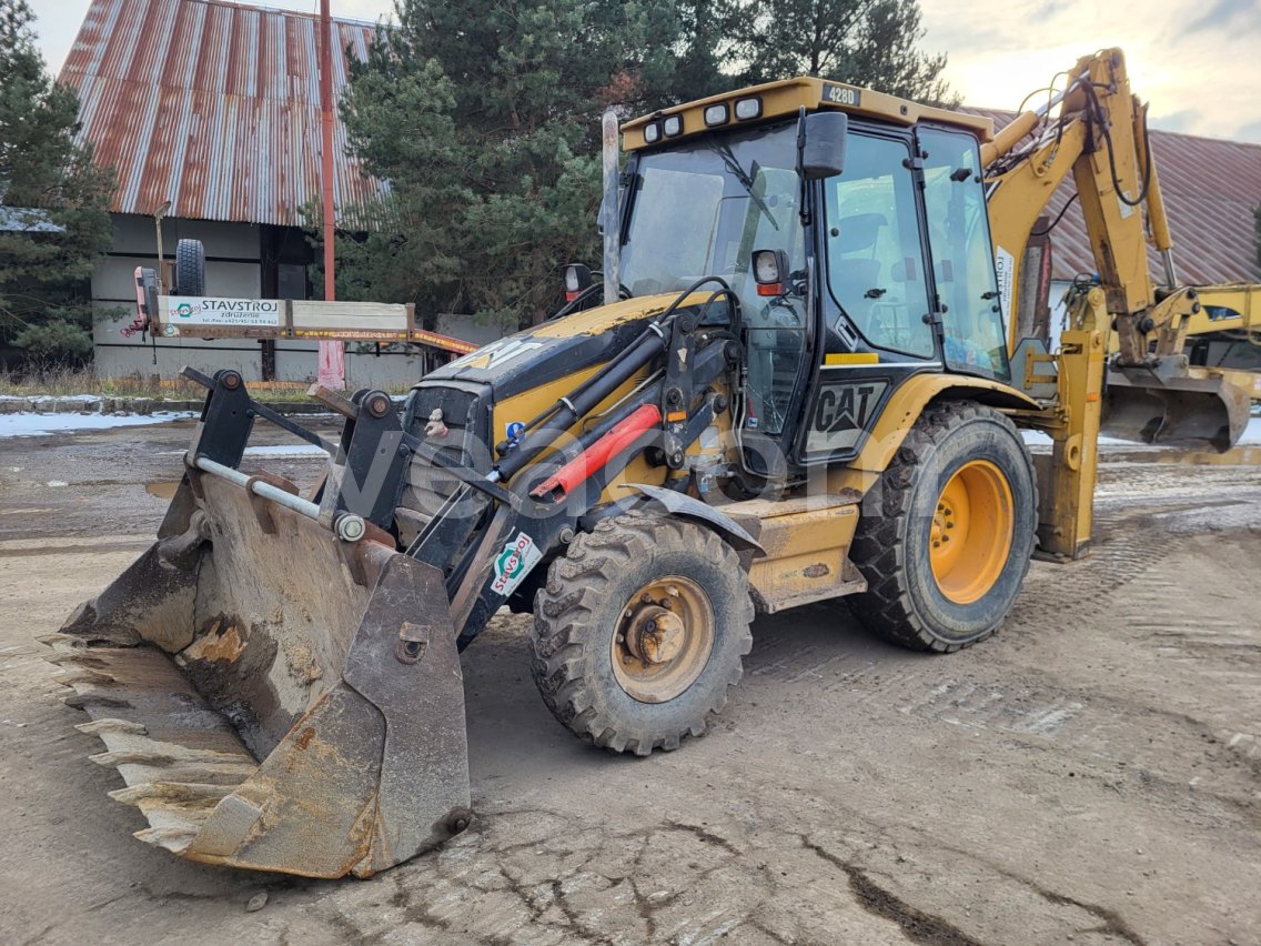 Online auction: CAT  428/D 4X4